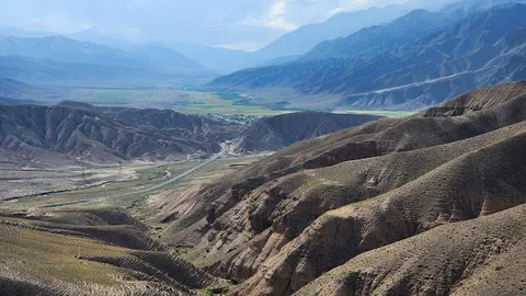 Naryn road-condition check — Safety stop — Kyrgyzstan South Loop — Kyrgyzstan